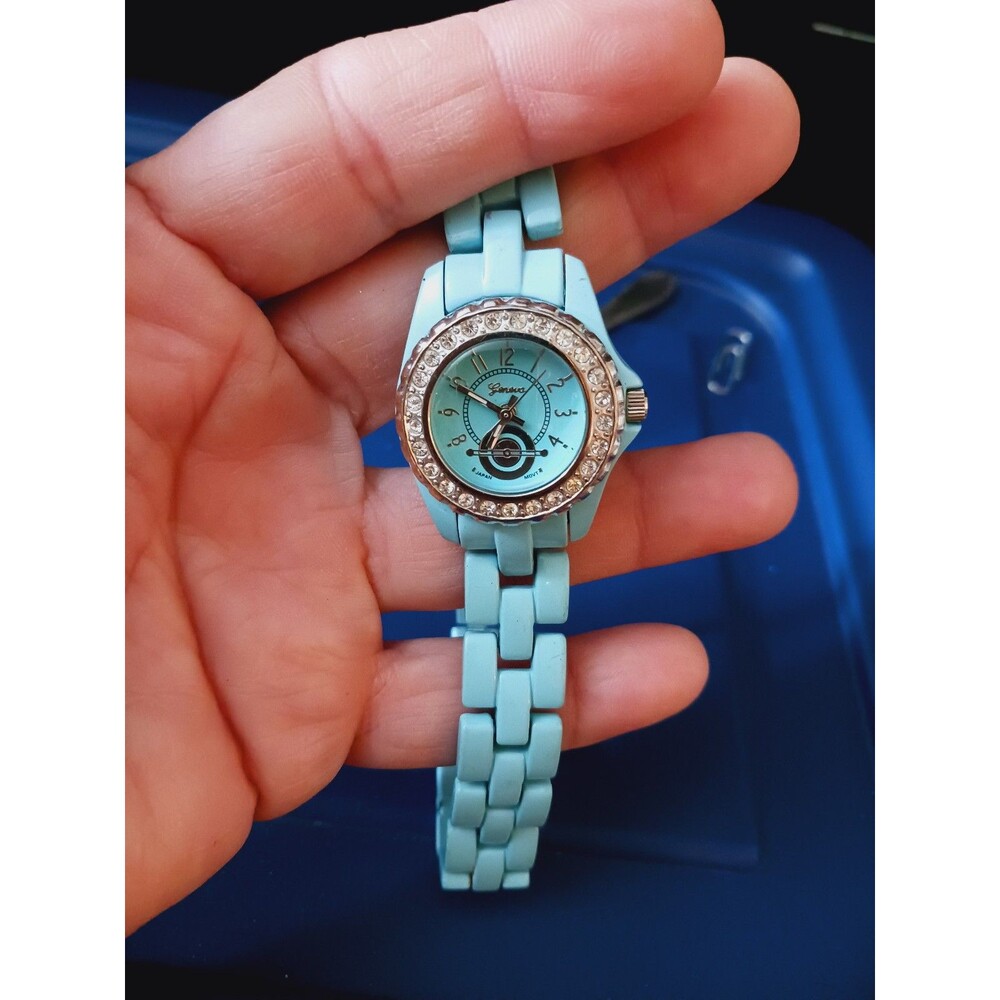 Geneva Platinum watch matching blue link band.